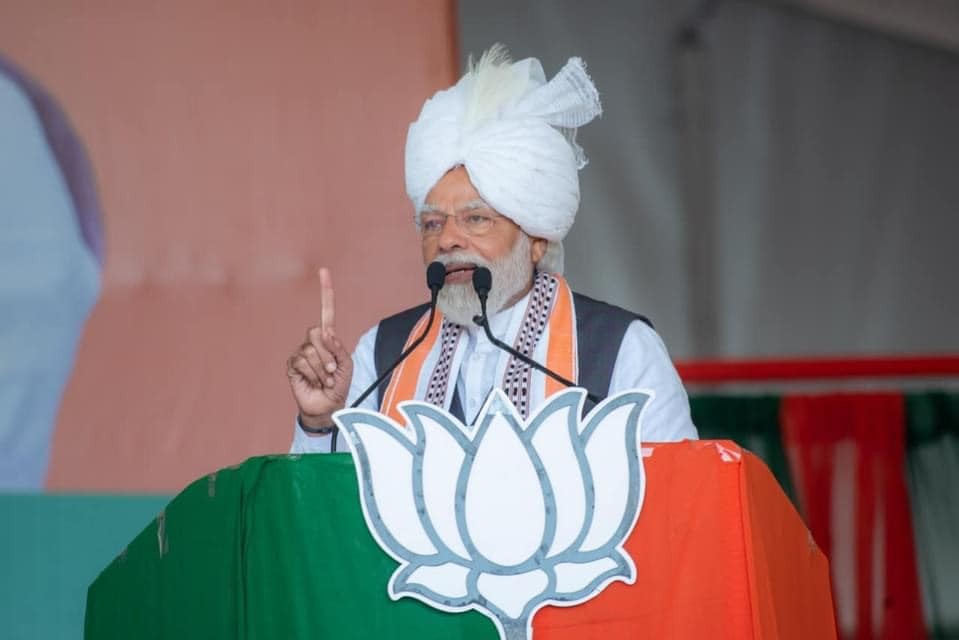 Prime Minister Narendra Modi addresses a BJP election rally at Luwangpokpa Multi Sports Complex, Luwangsangbam in north Imphal on February 22. (NNN Photo)